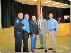 Pictured next to Johnny Padron (black jacket), friends of Jaime, and Chief Art Acevedo